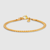Goldfarbendes Cuban-Armband aus 316L Edelstahl mit einem Gewicht von 6,3 g.