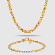 Goldfarbenes Schmuckset bestehend aus einer Cuban-Halskette und einem passenden Cuban-Armband aus 316L Edelstahl mit einem Gesamtgewicht von 23,0 g.
