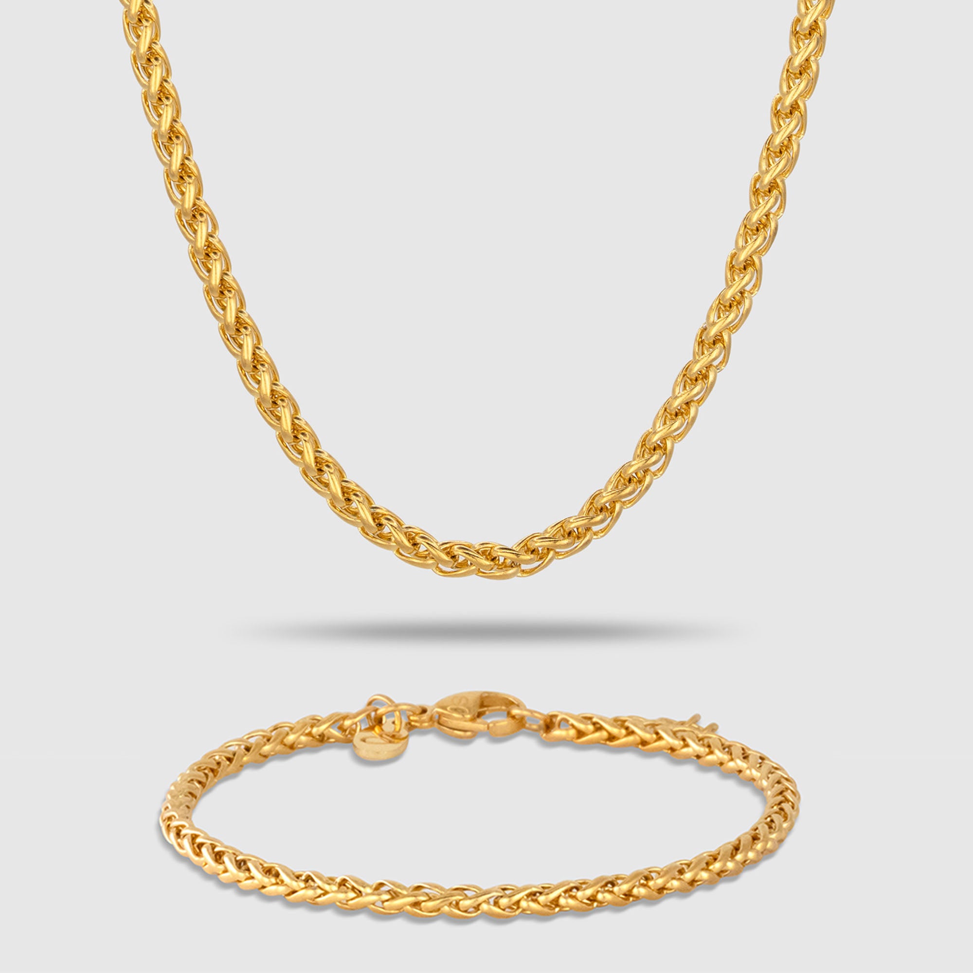 Goldfarbenes Schmuckset bestehend aus einer Wheat-Halskette und einem passenden Wheat-Armband aus 316L Edelstahl mit einem Gesamtgewicht von 18,6 g.