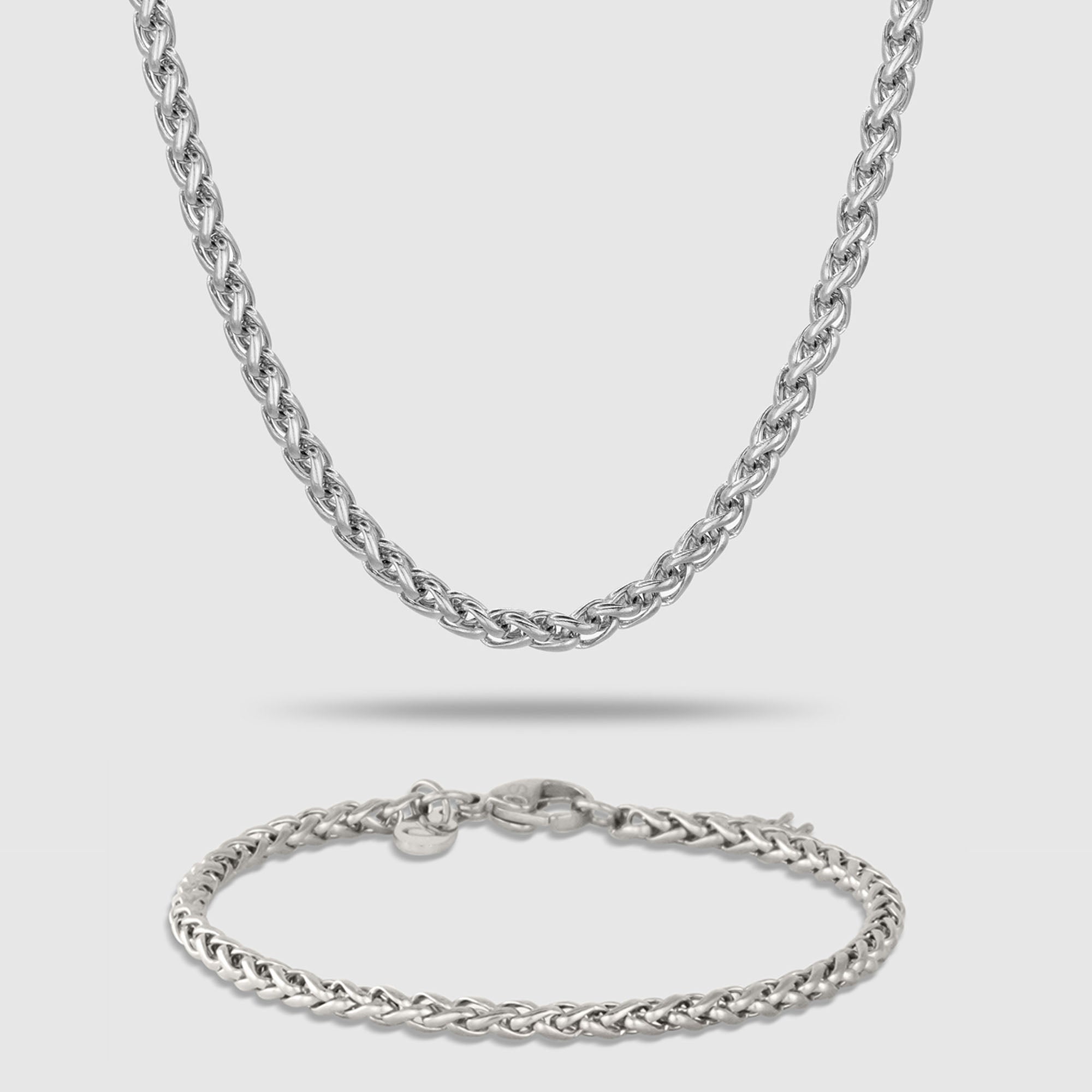 Silberfarbenes Schmuckset bestehend aus einer Wheat-Halskette und einem passenden Wheat-Armband aus 316L Edelstahl mit einem Gesamtgewicht von 18,6 g.